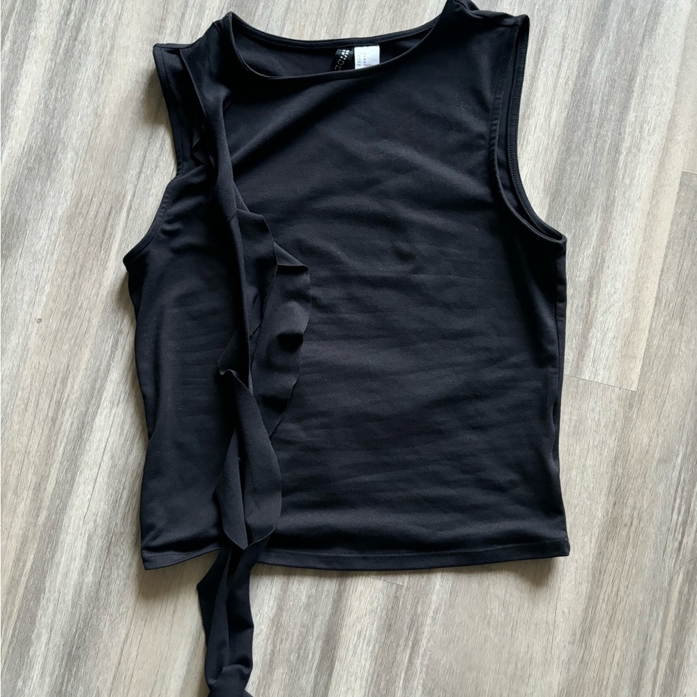 Soft black sleeveless top with fringe